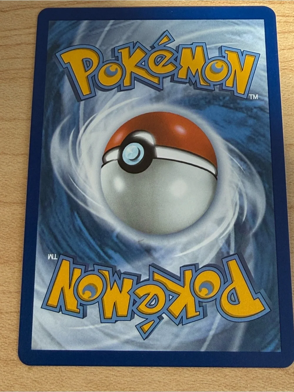 Pokemon Trainer Naveen Holographic Card - White, Green, Black, Brown